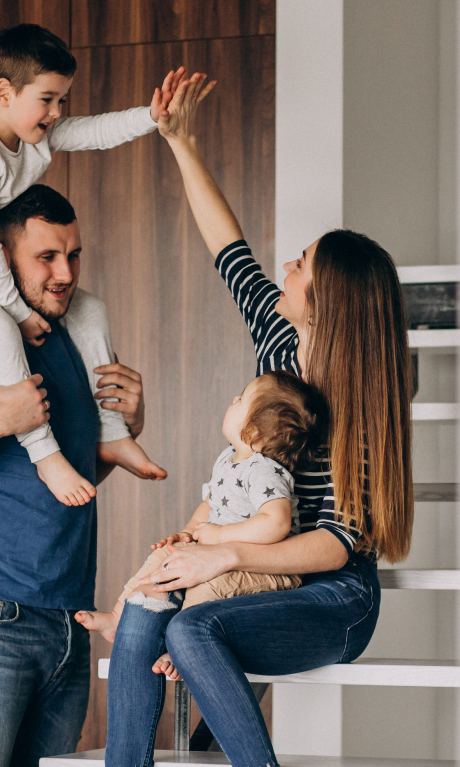 Young family with their little son at home having fun Young family with their little son at home having fun